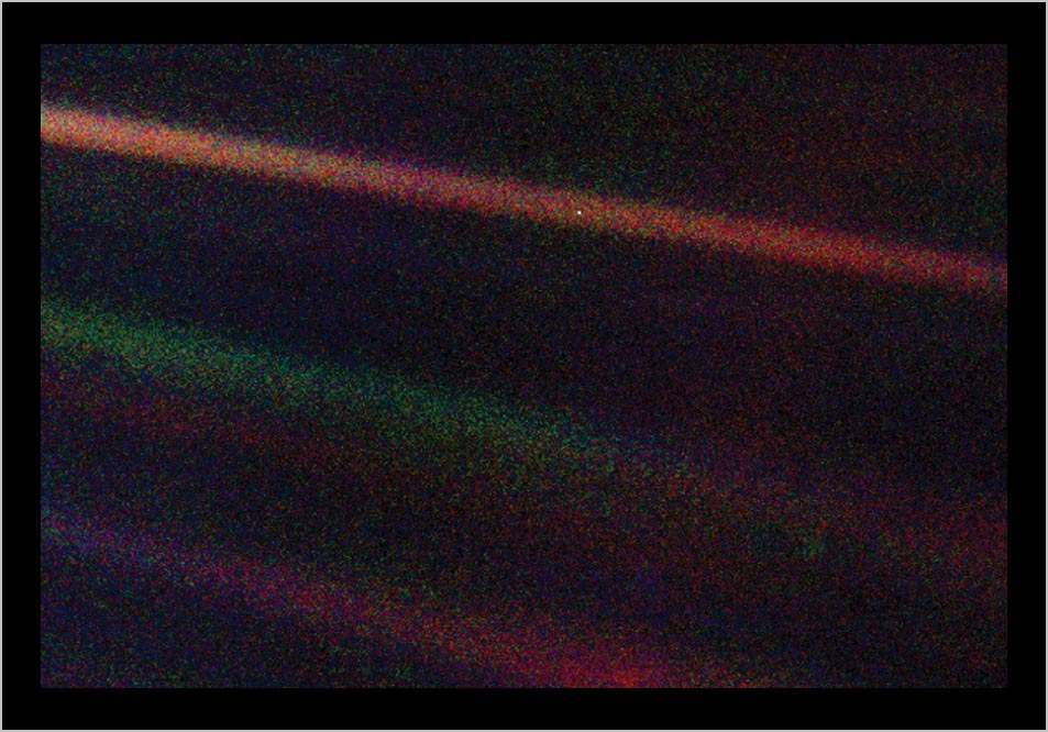 ALE BLUE DOT" (white pixel above) the last "Family Portrait" [ click photo for next . . . ] photograph of Earth made by VOYAGER I