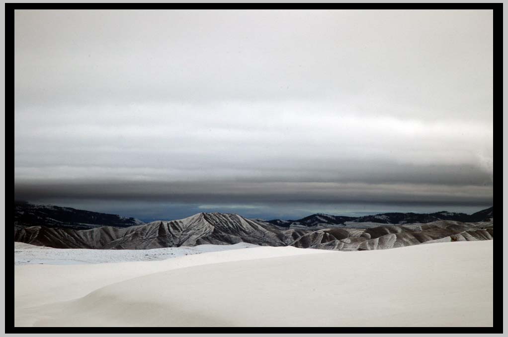 Distance, view Southeast over Snake River Canyon into Idaho, snowshoeing into the Eagle Cap Wilderness